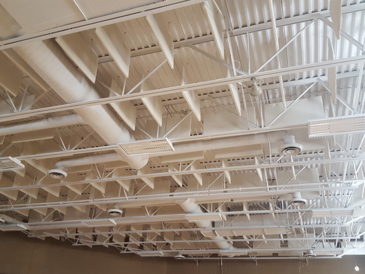 sound baffles control echo levels in loud gym space