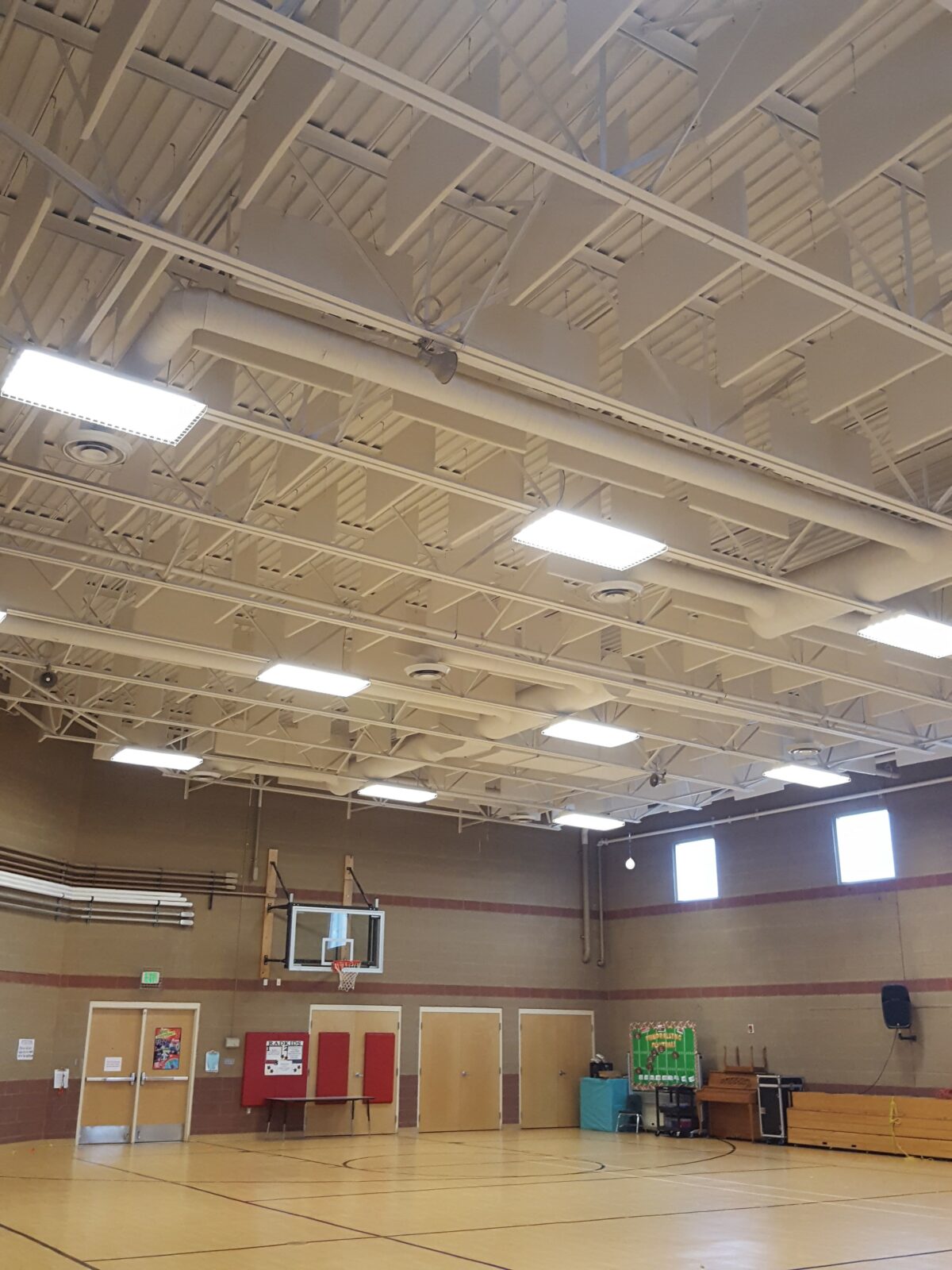 premium sound quality in a gym with acoustic baffles in metal deck