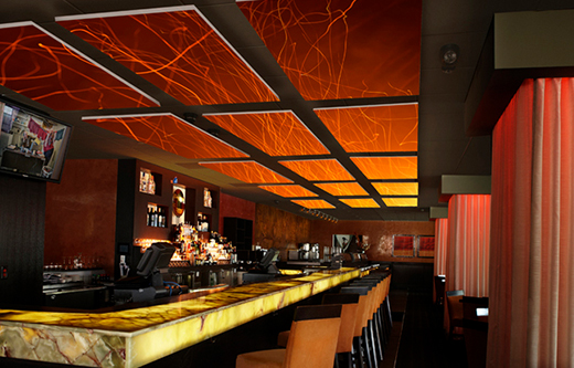 designer sound panels float over bar to control noise exposure levels for bar soundproofing