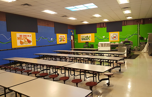 acoustic sound panels in walls to control noise and soundproof a loud cafeteria