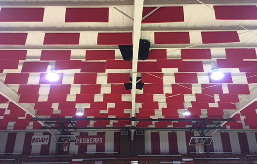 soundproofing a loud gym with red acoustic baffles