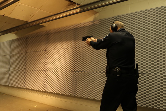 Pistol shooting at gun range